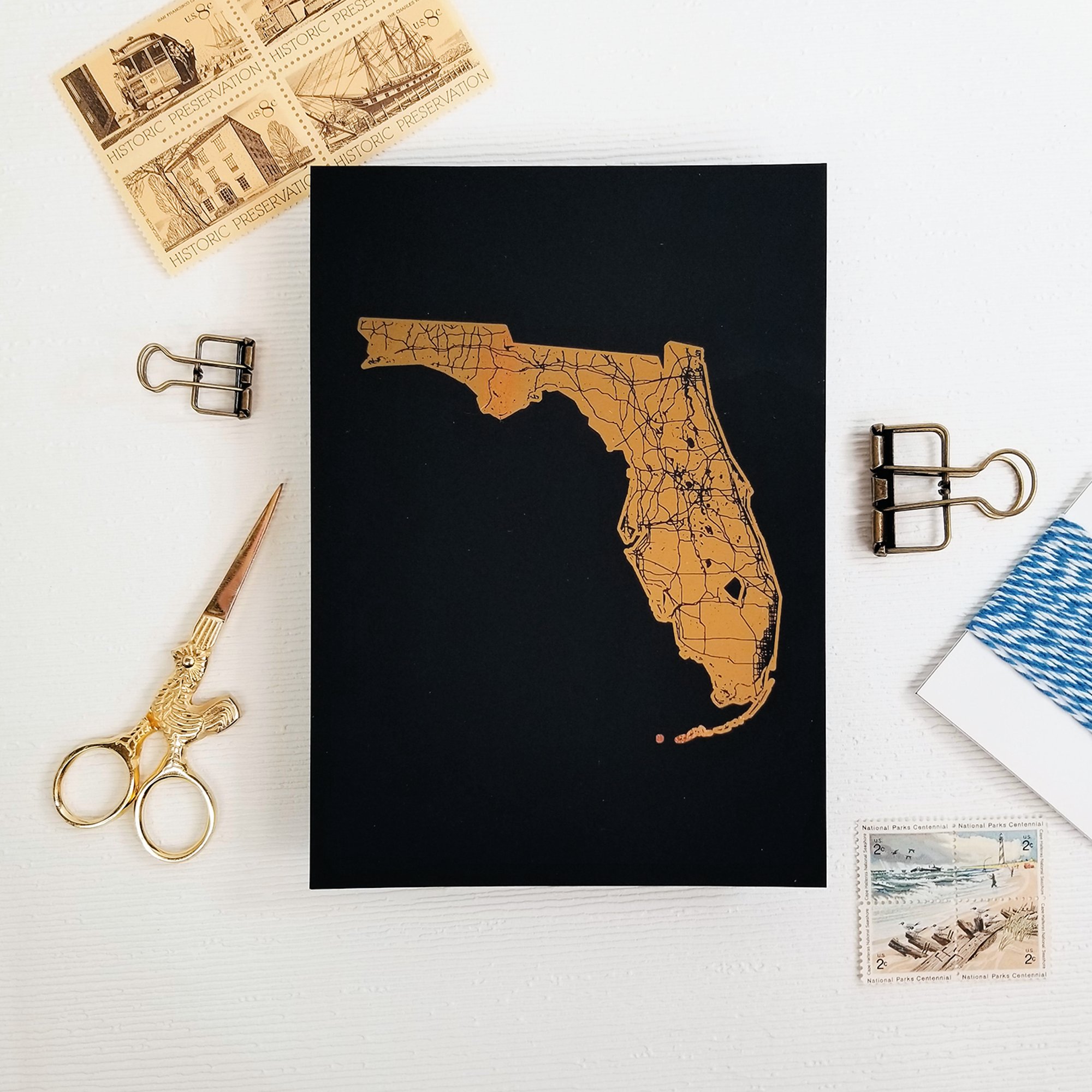 Gold foil Florida state map print on black paper